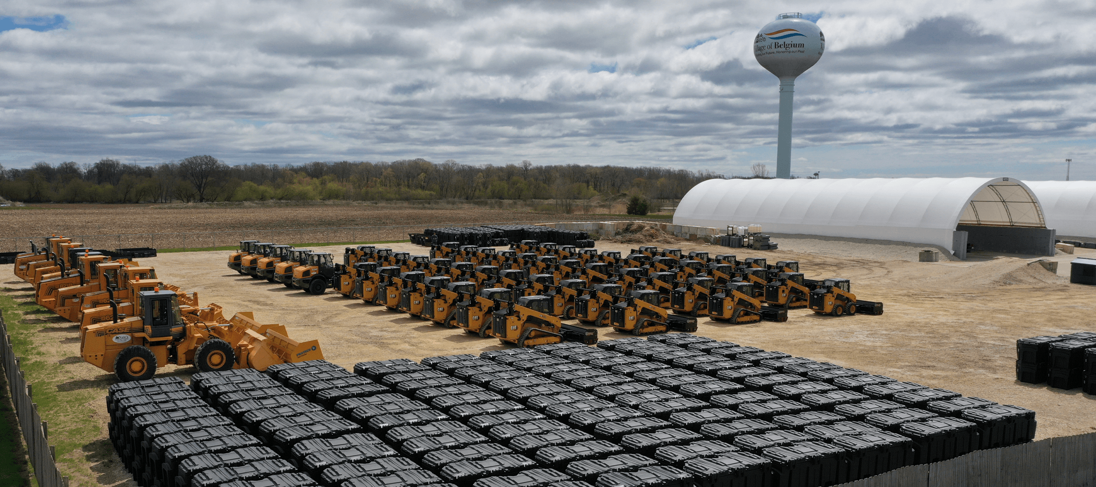 Image of loaders and attachments stacked